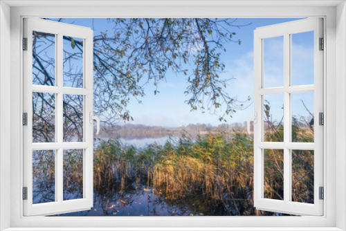 Fototapeta Naklejka Na Ścianę Okno 3D - Mist over a calm lake in the morning