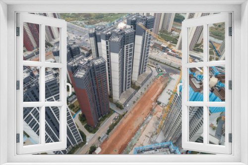 Fototapeta Naklejka Na Ścianę Okno 3D - Aerial view of multistory apartment construction site in China