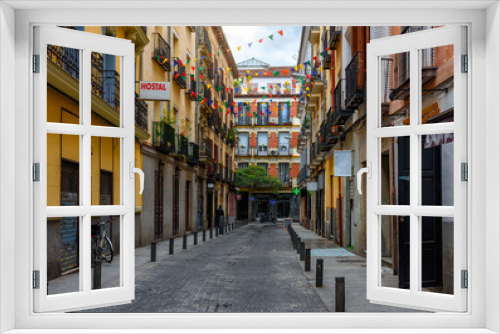Fototapeta Naklejka Na Ścianę Okno 3D - Old street in Madrid, Spain. Architecture and landmark of Madrid, postcard of Madrid.