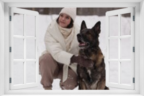 Fototapeta Naklejka Na Ścianę Okno 3D - smiling girl hugs her dog