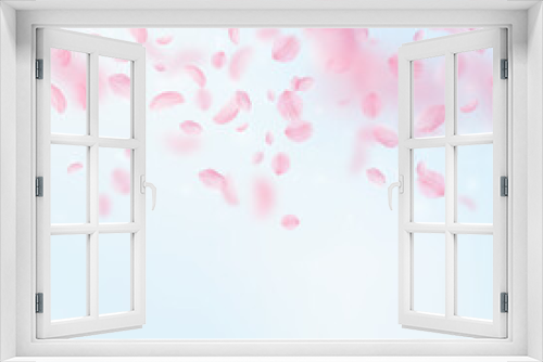 Sakura petals falling down. Romantic pink flowers gradient. Flying petals on blue sky square background. Love, romance concept. Outstanding wedding invitation.