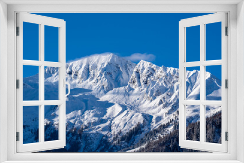 Fototapeta Naklejka Na Ścianę Okno 3D - view of the snow capped alps, the hohe tauern in the national park in austria, at a cold sunny winter morning