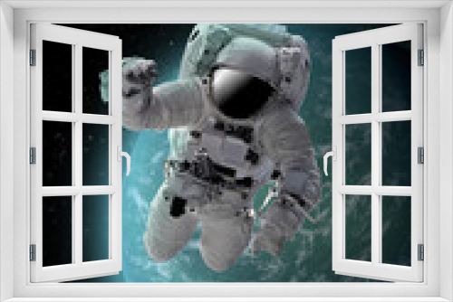 Fototapeta Naklejka Na Ścianę Okno 3D - Astronaut in outer open space over the planet .Stars provide the background.erforming a space above planet Earth.Sunrise,sunset.Our home. ISS.Elements of this Image Furnished by NASA.3D illustration