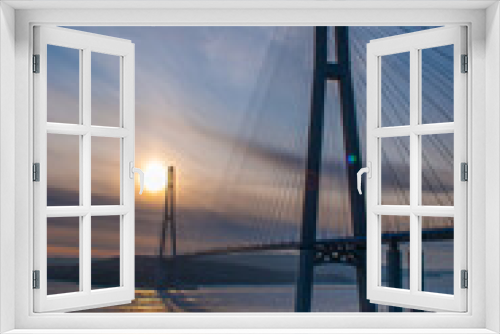 Fototapeta Naklejka Na Ścianę Okno 3D - Selective focus. Cable bridge. Night city. Vladivostok.