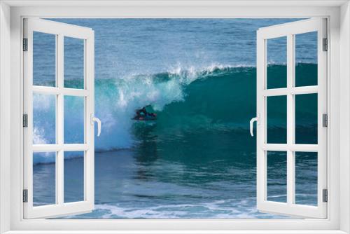 Fototapeta Naklejka Na Ścianę Okno 3D - Surfer in a perfect barrel wave