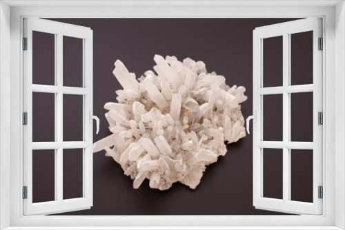 Fototapeta Naklejka Na Ścianę Okno 3D - A clear quartz cluster against a black background