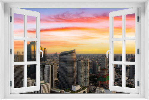 Fototapeta Naklejka Na Ścianę Okno 3D - Aerial view of modern office buildings in Bangkok downtown with sunrise time, Bangkok, Thailand