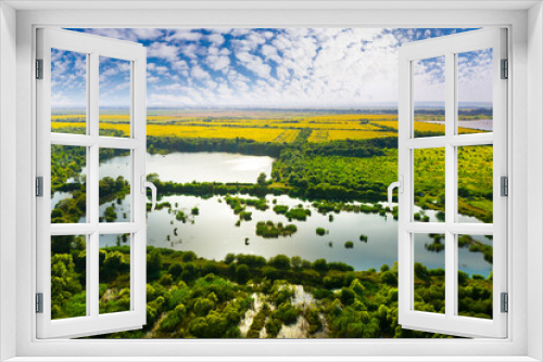 Fototapeta Naklejka Na Ścianę Okno 3D - Lakes and sunflowers, solar panels