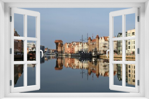 Fototapeta Naklejka Na Ścianę Okno 3D - Panorama of Old Town in Gdansk and Motlawa river with ships, Poland. Amazing reflections in water.