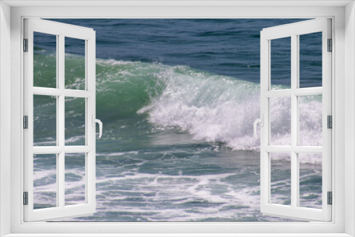 Fototapeta Naklejka Na Ścianę Okno 3D - Seascape with a wave rolling towards the beach