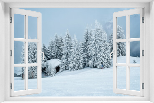 Fototapeta Naklejka Na Ścianę Okno 3D - Romantische weiße Wintertannen mit Hütte 
