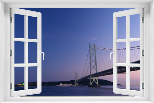 Fototapeta Naklejka Na Ścianę Okno 3D - 海に架かる橋の夕景。(コピースペース)