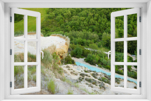 Fototapeta Naklejka Na Ścianę Okno 3D - Natural swimming pool in Bagno Vignoni, with thermal spring water and waterfall. Geothermal pools and hot springs in Tuscany, Italy.