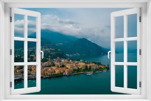 Fototapeta Naklejka Na Ścianę Okno 3D - Aerial view of Menaggio village on a coast of Como lake, Italy on a cloudy day