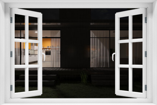 Fototapeta Naklejka Na Ścianę Okno 3D - Illuminated Kitchen View from the Backyard at Night 3D Rendering
