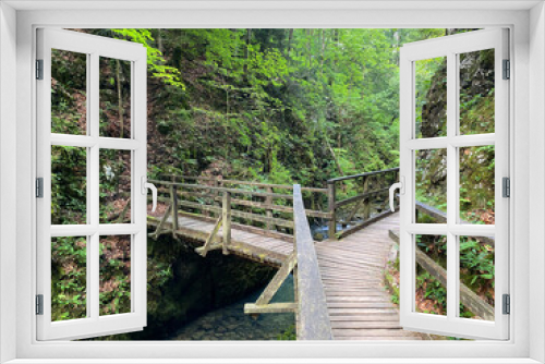 Fototapeta Naklejka Na Ścianę Okno 3D - Wooden hiking trails and bridges along the protected landscape of the Kamacnik canyon - Vrbovsko, Croatia (Drvene pješačke staze i mostići duž zaštićenog krajolika kanjona Kamačnik - Gorski kotar)