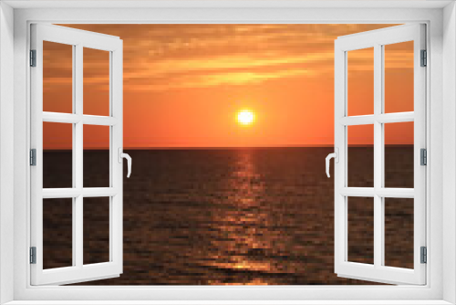 Fototapeta Naklejka Na Ścianę Okno 3D - 夕日に照らされた海の写真素材