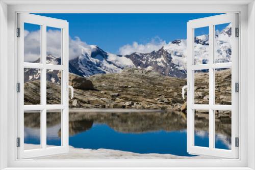 Fototapeta Naklejka Na Ścianę Okno 3D - View of idyllic clear lake in the italian alps during summer day of july