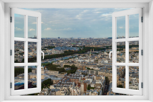 Aerial view of the city of Paris  with the nice Seine river seen from the Tour Eifel