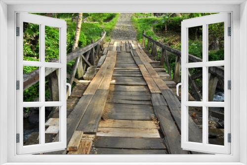 Fototapeta Naklejka Na Ścianę Okno 3D - River bridge made of wood