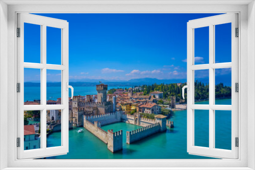 Fototapeta Naklejka Na Ścianę Okno 3D - Lake Garda, Sirmione, Italy. Italian castle on Lake Garda. Sirmione aerial view. Top view, historic center of the Sirmione peninsula, lake garda. Aerial panorama of Sirmione.