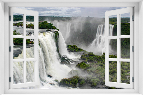 Fototapeta Naklejka Na Ścianę Okno 3D - A view of the Devil's Throat at the Iguazu Falls taken from the Brazilian side.