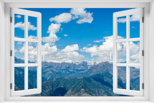 Fototapeta Naklejka Na Ścianę Okno 3D - Blue Sky with full of White Clouds, and green trees, and the mountain is full of greeneries, a magical view of north Pakistan, Shogran National Park. 