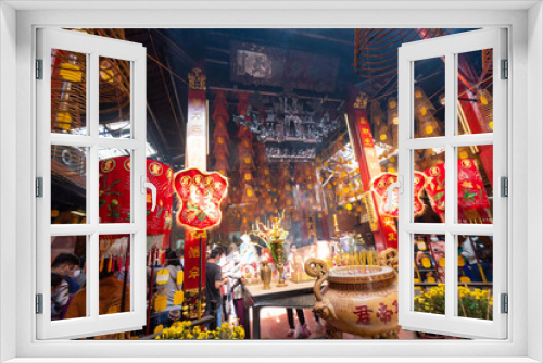 Fototapeta Naklejka Na Ścianę Okno 3D - Can Tho city people need poetry to go to pagodas on the occasion of the new year. This is the Ong temple  of the Chinese people