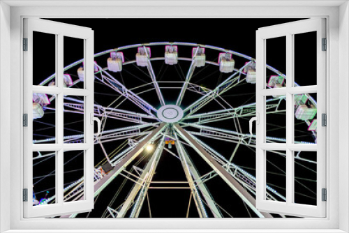 Fototapeta Naklejka Na Ścianę Okno 3D - Rueda de la fortuna en parque de diversiones por la noche