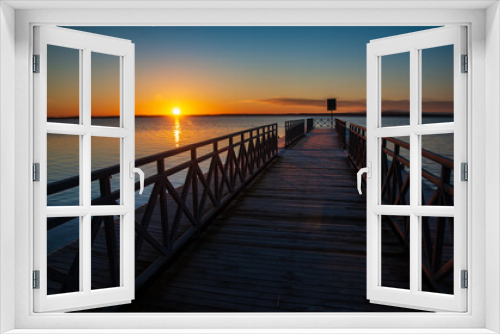 Fototapeta Naklejka Na Ścianę Okno 3D - Sunrise Lake Port Promenade