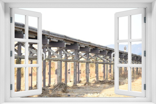 Fototapeta Naklejka Na Ścianę Okno 3D - 京都観光流れ橋木製橋