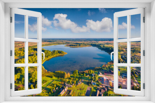 Fototapeta Naklejka Na Ścianę Okno 3D - Aerial landscape photography. Stunning morning view from flying drone of Pishchans'ke lake. Beautiful outdoor scene of Shatsky National Park, Volyn region, Ukraine, Europe. Beautiful summer scenery.