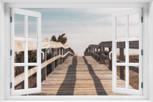 Fototapeta Naklejka Na Ścianę Okno 3D - Boardwalk Leading lines