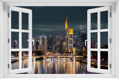 Fototapeta Naklejka Na Ścianę Okno 3D - FRANKFURT, GERMANY, 25 JULY 2020 Modern cityscape of the business district with reflection on the Main river at night