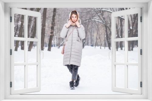 Full length portrait of young beautiful woman