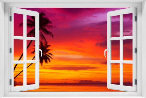 Fototapeta Naklejka Na Ścianę Okno 3D - Coconut palm trees on tropical island beach at sunset