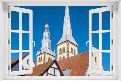 Fototapeta Naklejka Na Ścianę Okno 3D - steeple of the church in Lemgo in bright sunshine.