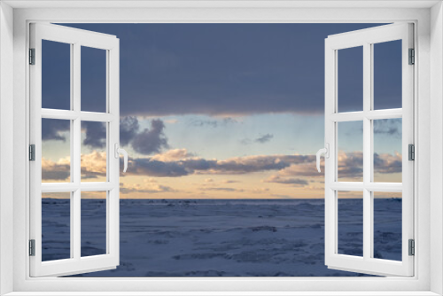 Fototapeta Naklejka Na Ścianę Okno 3D - Iced. over Lake Michigan - Frozen Lake with snow, beautiful colorful sky, and clouds and sunset color sky in the background