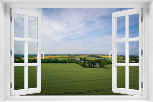 Fototapeta Naklejka Na Ścianę Okno 3D - Panorama Blick über Felder und Wälder