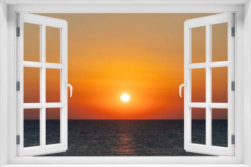 Fototapeta Naklejka Na Ścianę Okno 3D - The sun rising over the horizon