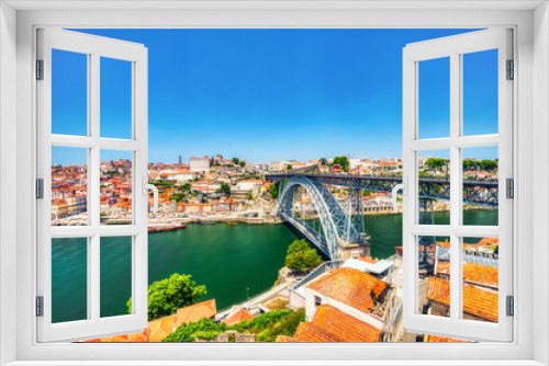 Fototapeta Naklejka Na Ścianę Okno 3D - Porto Aerial Cityscape with Luis I Bridge and Douro River during a Sunny Day