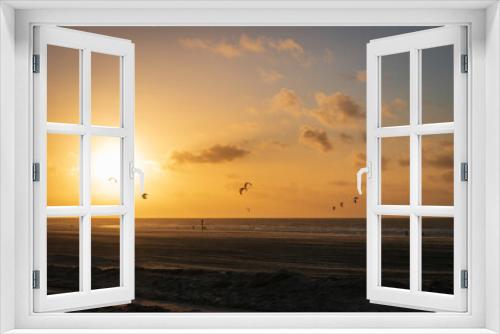 Fototapeta Naklejka Na Ścianę Okno 3D - Kitesurfer off Kijkduin North Sea beach at sunset