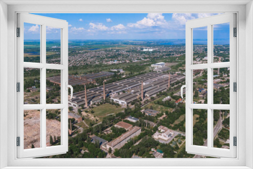 Fototapeta Naklejka Na Ścianę Okno 3D - Panoramic view of the industrial city of Nikopol in Ukraine. Beautiful landscape in the city. industrial area