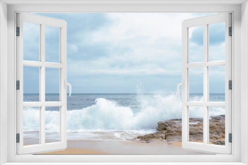 Fototapeta Naklejka Na Ścianę Okno 3D - High Tides Coming on to the Rocky Shores of Costa Brava in Spain, cloudy weather