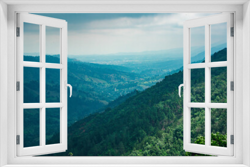 Fototapeta Naklejka Na Ścianę Okno 3D - Mountains hill during rain panorama look. Pick view on tropical forest land