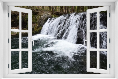 Fototapeta Naklejka Na Ścianę Okno 3D - a beautiful waterfall shot by long exposure