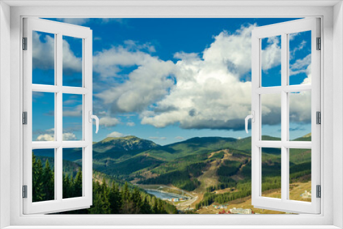 Fototapeta Naklejka Na Ścianę Okno 3D - Magnificent panoramic view the coniferous forest on the mighty Carpathians Mountains and beautiful blue sky background. Beauty of wild virgin Ukrainian nature. Peacefulness.