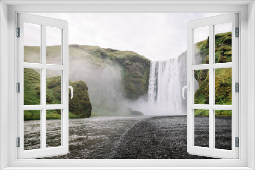 Fototapeta Naklejka Na Ścianę Okno 3D - Wide angle shot of Skogafoss waterfall located on Route 1 in Iceland