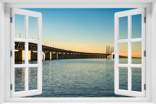 Fototapeta Naklejka Na Ścianę Okno 3D - Oresund Bridge connecting Denmark and Sweden at sunset