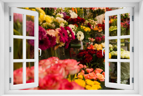 Fototapeta Naklejka Na Ścianę Okno 3D - beautiful bright interior of a flower shop in Ukraine with bouquets collected by professional florists
